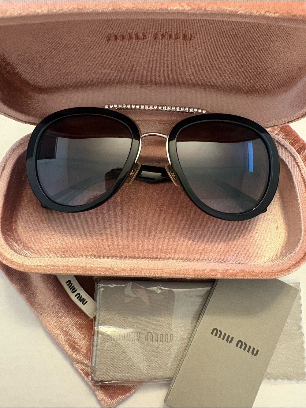 Miu Miu Black & Silver Frame Sunglasses with Grey Gradient Lenses